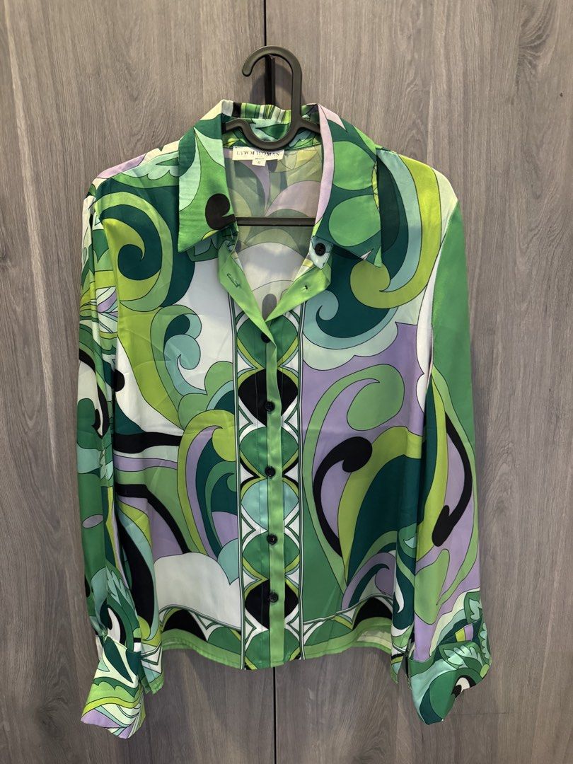 Printed Green Top and Skirt Set (Category: Sets or Coordinates) located in Taguig. Submitted by kittychum (Listing ID 1439582461, Image 1). Description: SOLD AS SET - LYW WOMAN top and skirt set - Top: Size Small, button-down, long sleeves (fits Medium) - Print: Green, purple, and white - Skirt: Matching print and design - Skirt Size: Large.