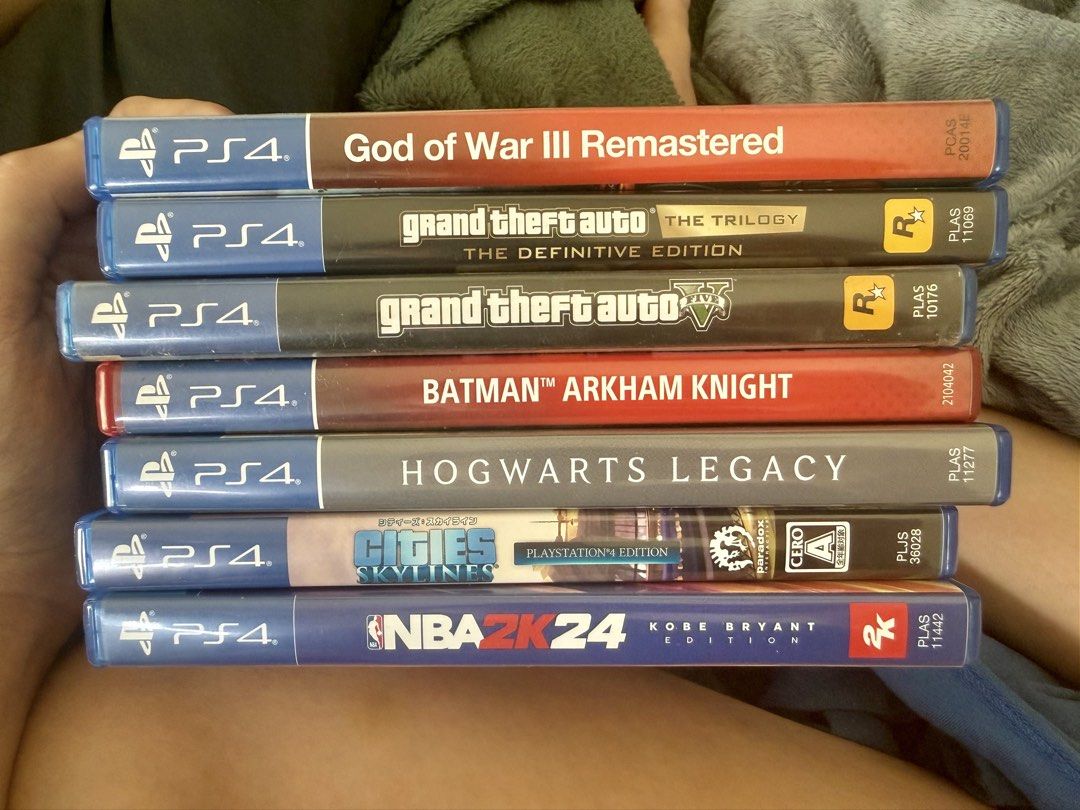 PS4 Games (Category: PlayStation) located in Manila. Submitted by k.kitsune (Listing ID 1439599030, Image 2). Description: PS4 Games For Sale 🎮 All games are working and in good condition. Individual Prices: * Hogwarts Legacy – ₱1,500 ❗️SOLD❗️ * NBA 2K24 Kobe Bryant Edition – ₱1,000-❗️SOLD❗️ * GTA Trilogy Definitive Edition – ₱1,000 ❗️SOLD❗️ * GTA V – ₱700 ❗️SOLD❗️ * God of War III Remastered – ₱500 * Batman Arkham Knight – ₱400 * Cities Skyline