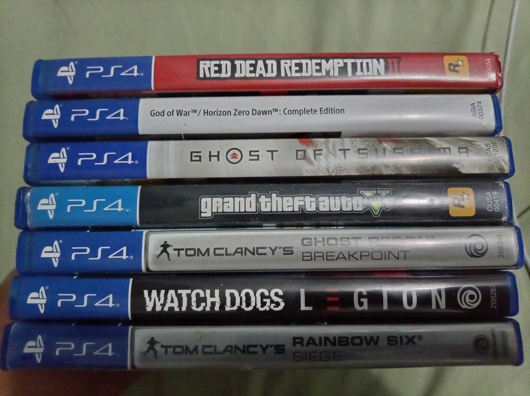 PS4 Games - Red Dead Redemption 2, GTA V, and More (Category: PlayStation) located in Manila. Submitted by mysticbird-0902 (Listing ID 1439471749, Image 1). Description: - Red Dead Redemption 2 (PS4) - God of War / Horizon Zero Dawn: Complete Edition (PS4) - Ghost of Tsushima (PS4) - Grand Theft Auto V (PS4) - Tom Clancy's Ghost Recon Breakpoint (PS4) - Watch Dogs Legion (PS4) - Tom Clancy's Rainbow Six Siege (PS4) All games are for PlayStation 4