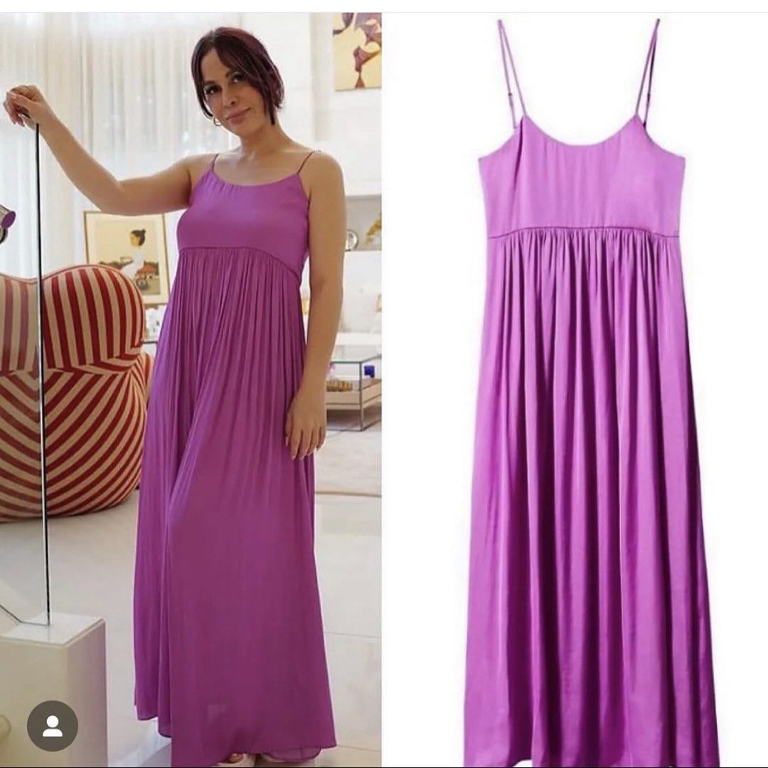 Purple Maxi Dress with Spaghetti Straps (Category: Dresses) located in Quezon City. Submitted by classychicph92 (Listing ID 1439446164, Image 1). Description: - Elegant purple maxi dress - Spaghetti straps - Pleated bodice - Flowing, floor-length design - Perfect for special occasions - Stylish for everyday wear - Vibrant purple color.