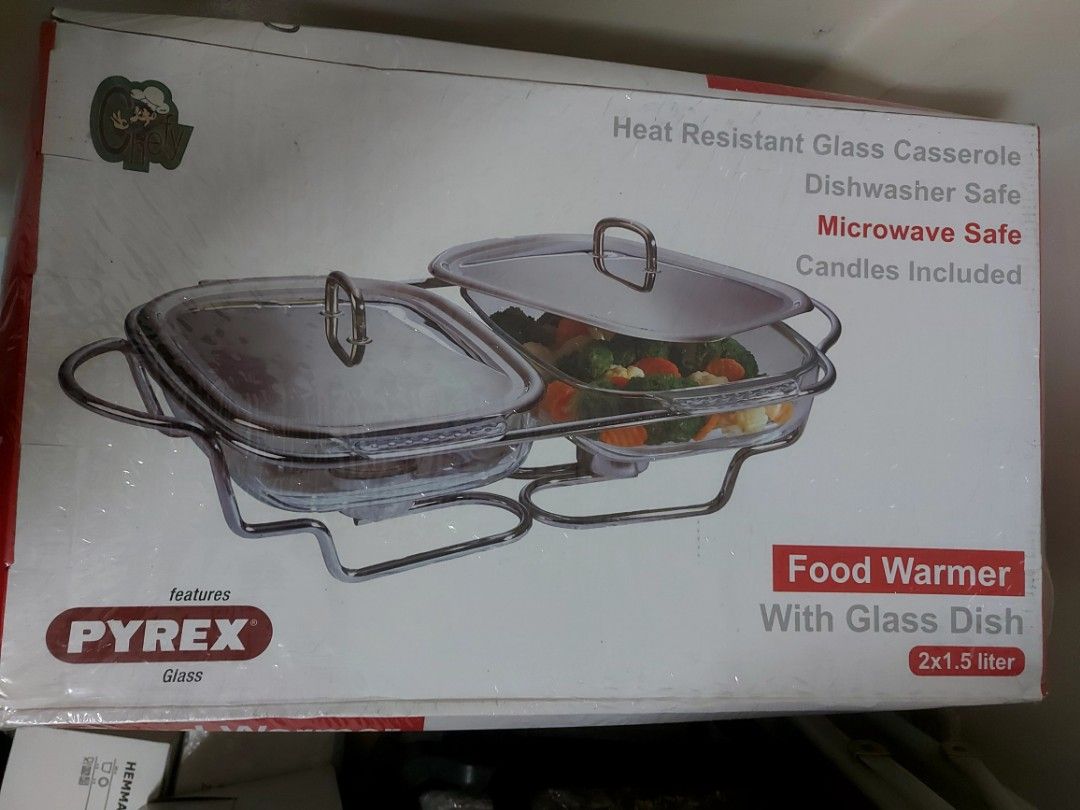 Pyrex Food Warmer with Glass Dish (Category: Food Organization & Storage) located in Manila. Submitted by zenfire_132852 (Listing ID 1439432727, Image 1). Description: 3boxes available for take all Php5000 Super Deal - Pyrex food warmer with glass dish - Heat-resistant glass - Dishwasher and microwave safe - Includes candles - Glass dish capacity: 2 x 1.5 liters - Ideal for keeping food warm at events.