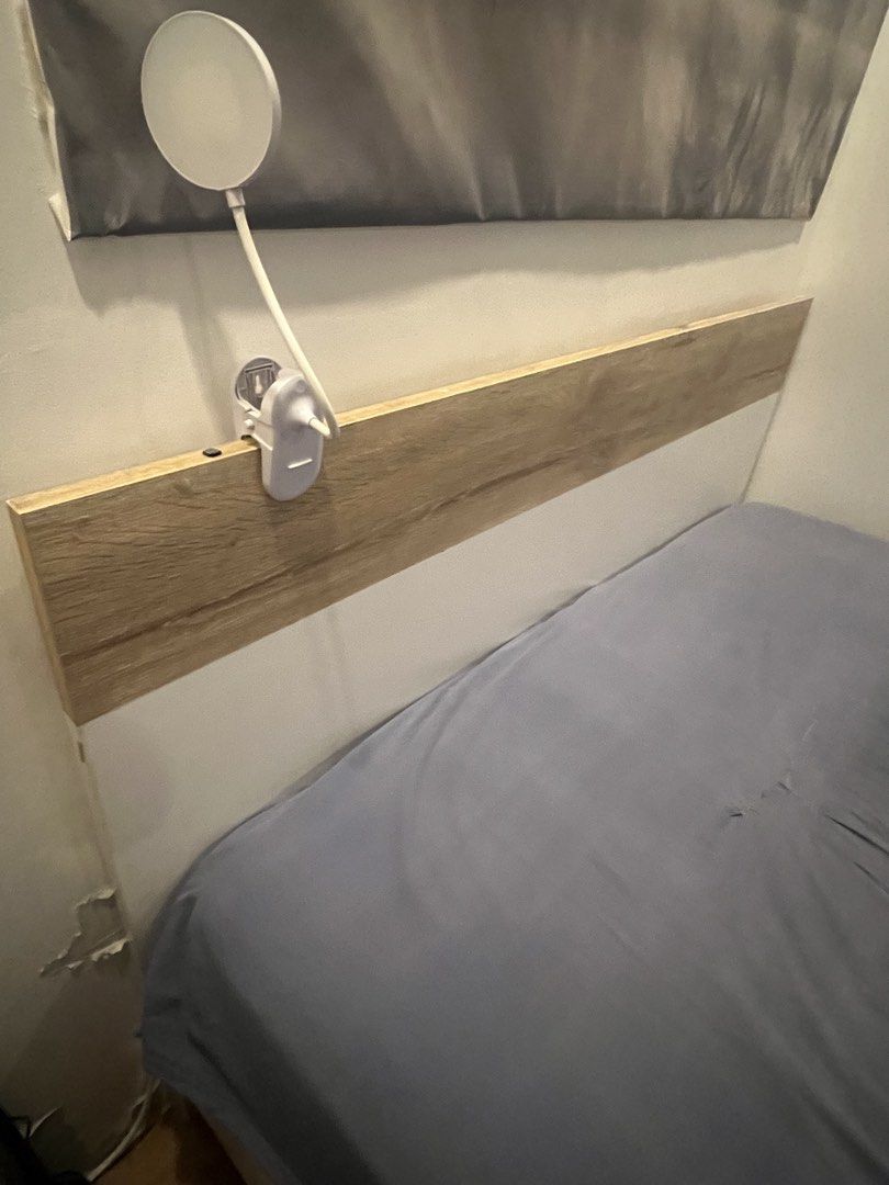 Queen Size Bed Frame with Headboard and mattress (Category: Bed Frames & Mattresses) located in Manila. Submitted by adrianojr56673 (Listing ID 1439540541, Image 2). Description: - Queen-size bed frame plus mattress - White color headboard - Features a headboard with wooden accent - Bed frame height: approximately 16 inches - Shown with a blue bedsheet (bedsheet not included) - Bed frame and mattress (12” uratex premium) -bring your own carpenter