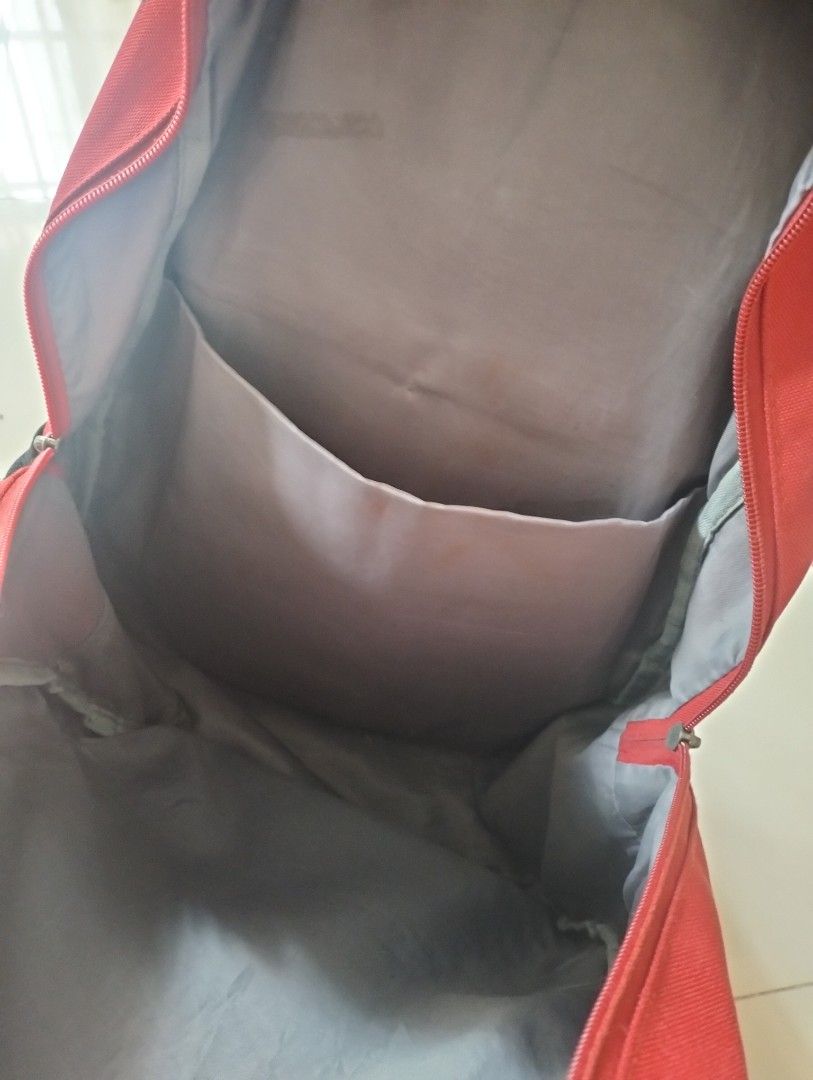 Red and Black Backpack (Category: Backpacks) located in San Mateo. Submitted by georgebread (Listing ID 1439466323, Image 3). Description: for sale Red Backpack for 65 pesos flaws indicated in the pictures needs wash all zippers working location: San Mateo, Rizal.