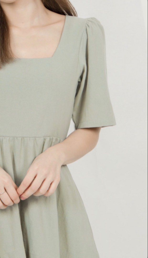 Sage Green Square Neck Dress (Category: Dresses) located in Quezon City. Submitted by bsrys (Listing ID 1439573589, Image 1). Description: - Sage green dress - Square neckline - Short puff sleeves - Fitted waist - Flared skirt - Lightweight fabric - Back zipper closure - With Pockets RFS: Decluttering.