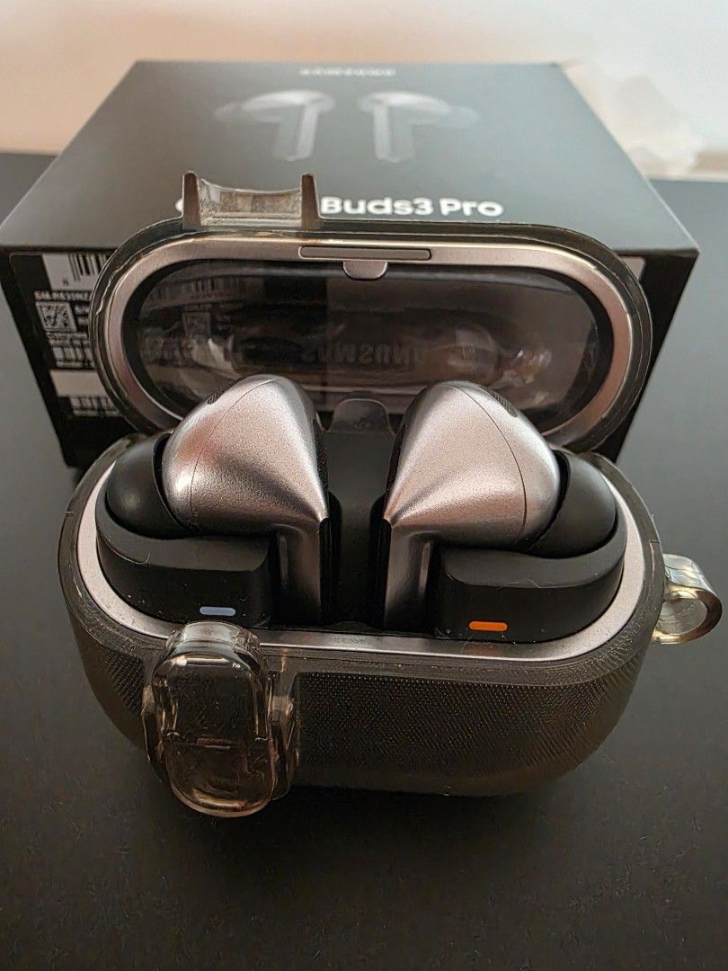 Samsung Galaxy Buds3 Pro (Category: Earphones) located in Makati City. Submitted by nette_pgdn (Listing ID 1439508149, Image 2). Description: - Samsung Galaxy Buds3 Pro earbuds - Color: Silver and Black - Charging Case: Transparent - Includes original box - Box features Samsung logo and "Galaxy Buds3 Pro" -Price is Negotiable.