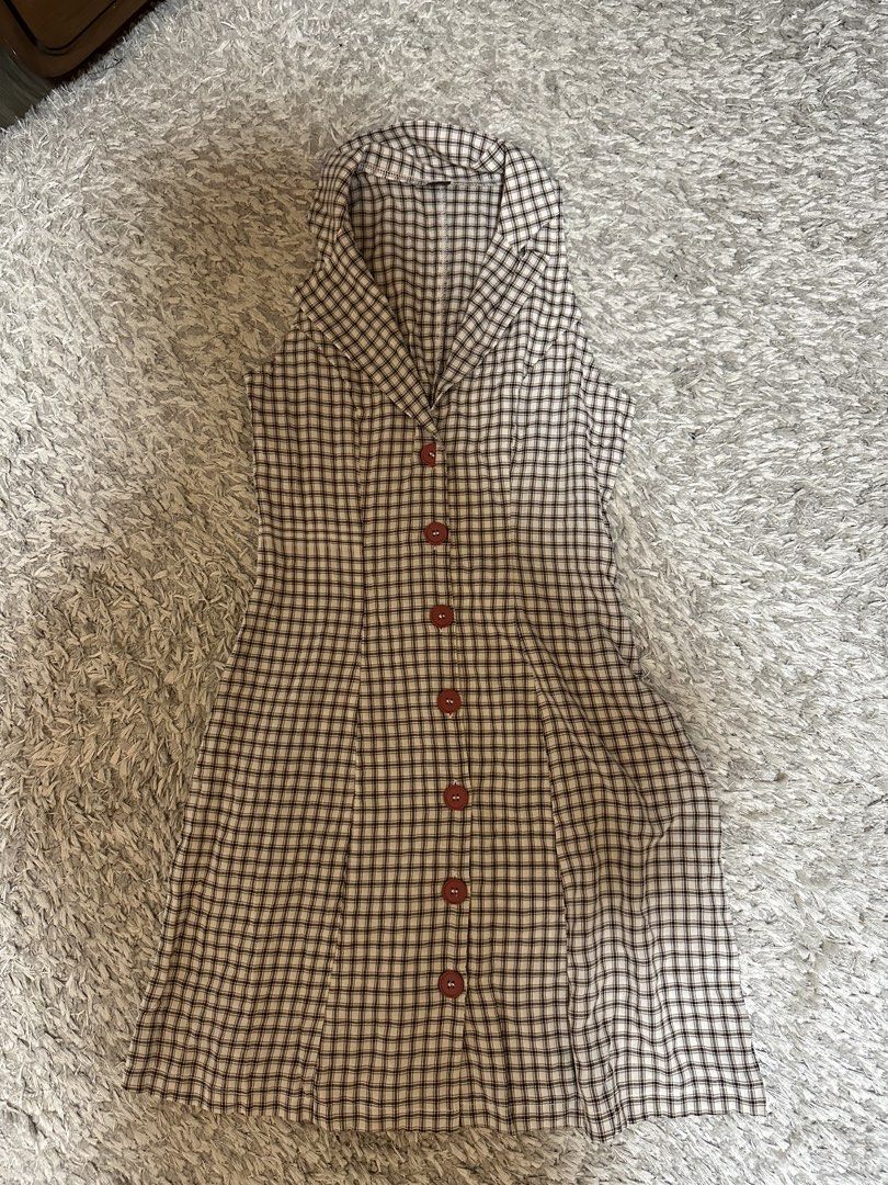 SHEIN Plaid Dress (Category: Dresses) located in Magalang. Submitted by oohgabby (Listing ID 1439526816, Image 1). Description: - SHEIN Plaid Dress - Size: S - Design: Button-down - Sleeveless - Features: Collared neckline - Color: Neutral - Perfect for various occasions!.