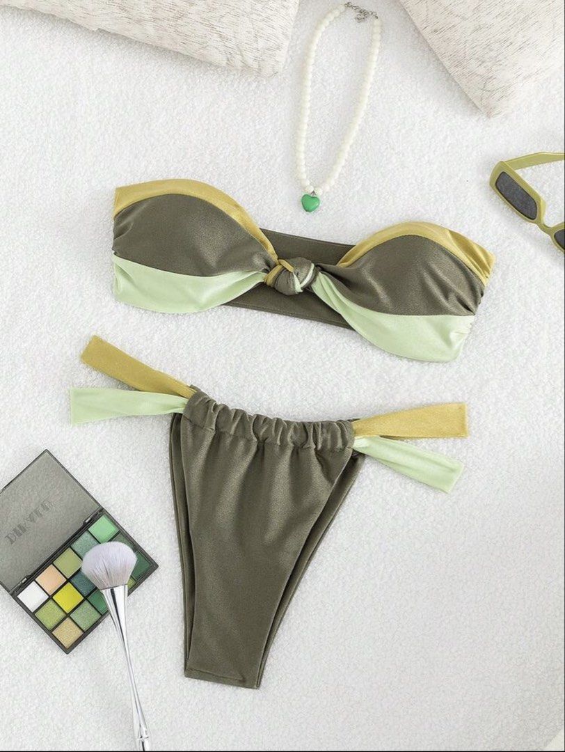 SHEIN Strapless Bikini Set (Category: Bikinis & Swimsuits) located in Valenzuela. Submitted by kimerunn (Listing ID 1439476487, Image 1). Description: - Two-piece bikini set - Strapless top with knot detail - Matching string tie bottom - Color block design - Green and yellow shades - Ideal for beach trips and pool parties.
