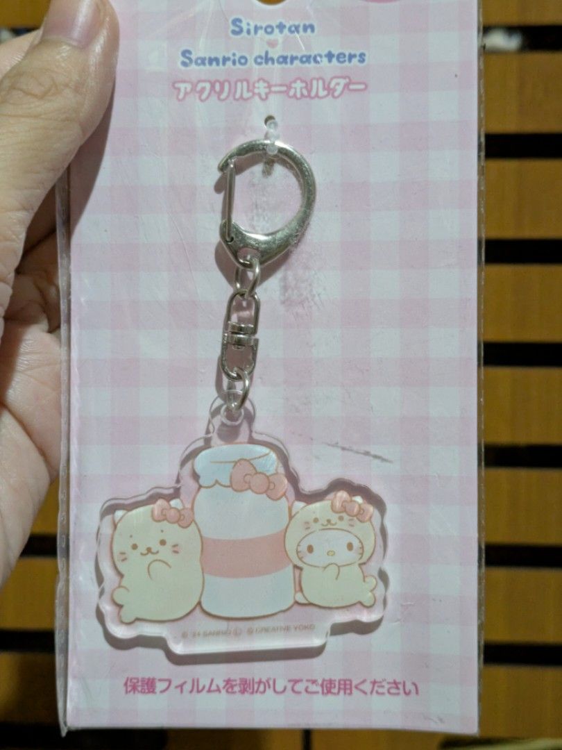 Sirotan x Sanrio Hello Kitty Acrylic Keychain (Category: Character Goods) located in Batangas. Submitted by mirajane._ (Listing ID 1439598877, Image 2). Description: Official Sirotan x Sanrio Hello Kitty Acrylic Keychain Anik Anik. 🤍 Authentic from Japan. 🤍 Still in its original plastic packaging. Actual photos posted. What you see is what you get. Please review the photos carefully for the actual condition. Pay as you order. No reservations. P