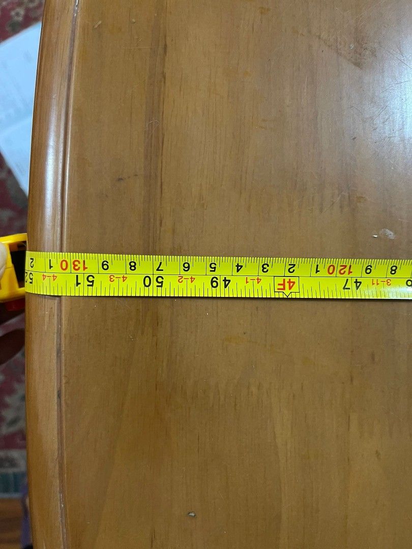 Solid Wood Extendable Dining Table （分類：桌子）位於 Hong Kong。 由 spreeshopper 提交（商品編號 1439463497，圖片 2）。簡介： Wooden dining table with a light brown finish. The table has a rectangular shape with rounded corners. The table's length is approximately 130cm, and the width is approximately 80cm. It has four legs.。
