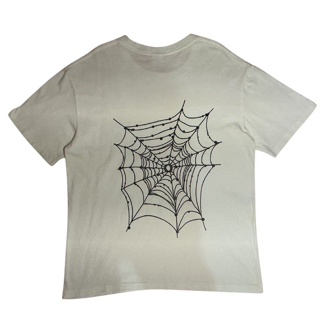 Spectravision Spider Web Graphic T-Shirt (Category: Tshirts & Polo Shirts ) located in Meycauayan. Submitted by dhrift_zai (Listing ID 1439573360, Image 2). Description: * Dual-Print Crewneck Graphic T-Shirt; Crisp White with Black & Red Graphic Spider Details * Size: Pit to Pit (20 inches),Length (26. 8inch) Condition: Good (Note: faint, minor storage smudge) Never Used. Payment Methods: GCash, Delivery Options (shoulder by buyer): • Grab • Lala