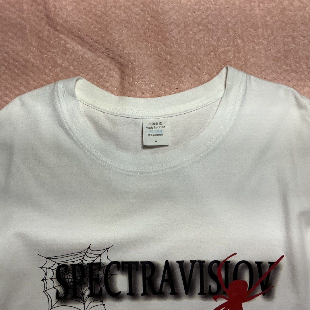 Spectravision Spider Web Graphic T-Shirt (Category: Tshirts & Polo Shirts ) located in Meycauayan. Submitted by dhrift_zai (Listing ID 1439573360, Image 3). Description: * Dual-Print Crewneck Graphic T-Shirt; Crisp White with Black & Red Graphic Spider Details * Size: Pit to Pit (20 inches),Length (26. 8inch) Condition: Good (Note: faint, minor storage smudge) Never Used. Payment Methods: GCash, Delivery Options (shoulder by buyer): • Grab • Lala