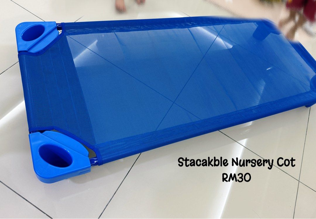 Stackable Nursery Cot - Blue (Category: Cots & Cribs) located in Kajang. Submitted by ipretty_cmx (Listing ID 1439533370, Image 1). Description: - Stackable nursery cot - Vibrant blue color - Mesh surface for comfort - Easy stacking and storage - Space-saving design - Perfect for nurseries or play areas - Price: RM30.