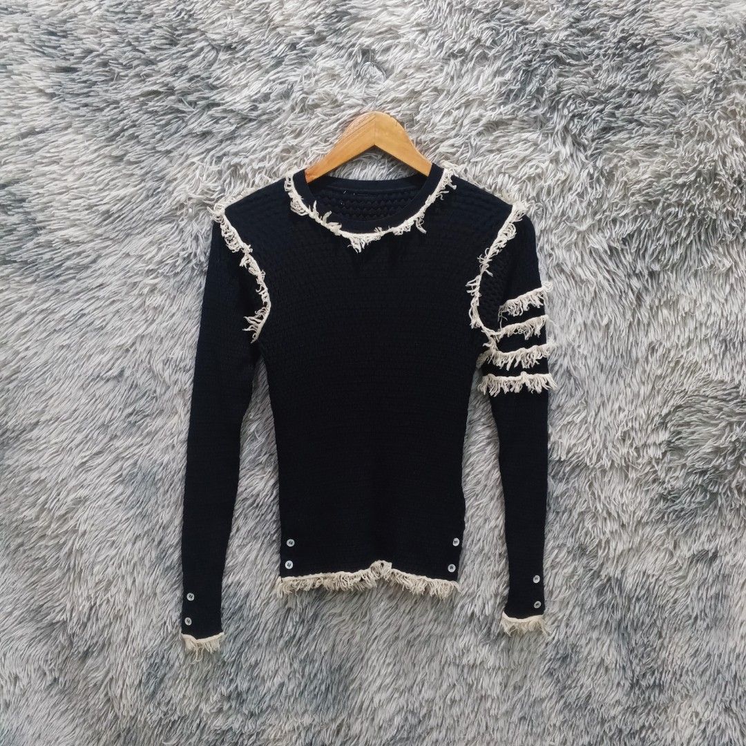 Thom Browne Black Knit Sweater (Category: Luxury Apparel) located in Malasiqui. Submitted by drie_findss (Listing ID 1439549427, Image 1). Description: Thom Browne White Fray Navy Wool ‎_______________________ ‎Size: 1 on tag ‎(Measured by Inches) ‎Width: 12 ‎Length: 22 ‎Shoulder: 11 ‎Sleeve: 22 ‎Condition: EXCELLENT ‎Color Rate: 10/10 ‎Issue: No MAINTAG ‎_______________________ ‎ ‎Color may vary due to lightning so check wisely. ‎Thank you for y
