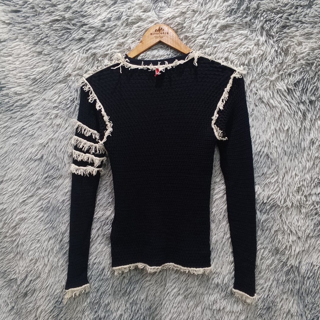 Thom Browne Black Knit Sweater (Category: Luxury Apparel) located in Malasiqui. Submitted by drie_findss (Listing ID 1439549427, Image 3). Description: Thom Browne White Fray Navy Wool ‎_______________________ ‎Size: 1 on tag ‎(Measured by Inches) ‎Width: 12 ‎Length: 22 ‎Shoulder: 11 ‎Sleeve: 22 ‎Condition: EXCELLENT ‎Color Rate: 10/10 ‎Issue: No MAINTAG ‎_______________________ ‎ ‎Color may vary due to lightning so check wisely. ‎Thank you for y
