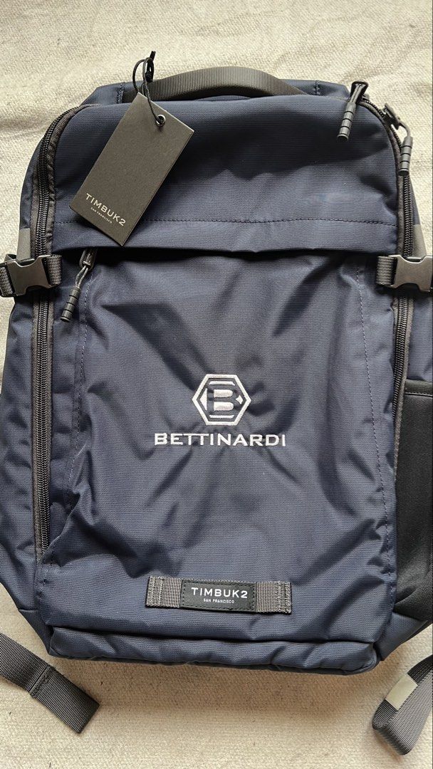 Timbuk2 Bettinardi Backpack (Category: Backpacks) located in Cagayan de Oro. Submitted by nelsondel21723 (Listing ID 1439525835, Image 2). Description: - Timbuk2 backpack - Features a Bettinardi logo - Multiple compartments (main, side pockets) - Adjustable straps - Top handle - Durable, water-resistant material - Includes a tag.