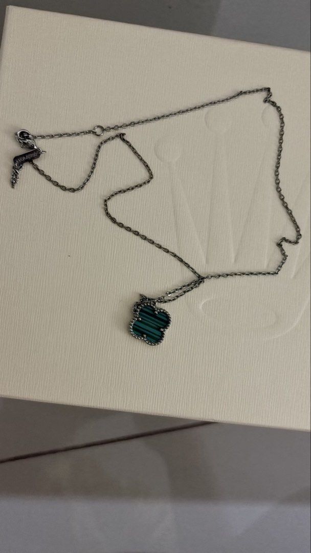 Van Cleef & Arpels Alhambra Necklace (Category: Necklaces) located in Manila. Submitted by rarewhale_9a584c (Listing ID 1439555805, Image 1). Description: - Silver-toned chain necklace - Clover-shaped pendant with a green stone -need’s cleaning - Van Cleef & Arpels clasp - Perfect accessory to elevate any look.