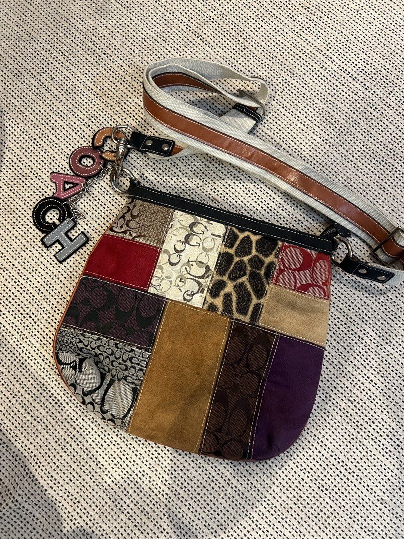 Vintage Coach sling bag with Charm (Category: Other Accessories) located in Makati City. Submitted by makenziet (Listing ID 1439531723, Image 1). Description: - Cream and brown Coach bag strap - Includes a "COACH" charm - Silver clasps - Crossbody strap.