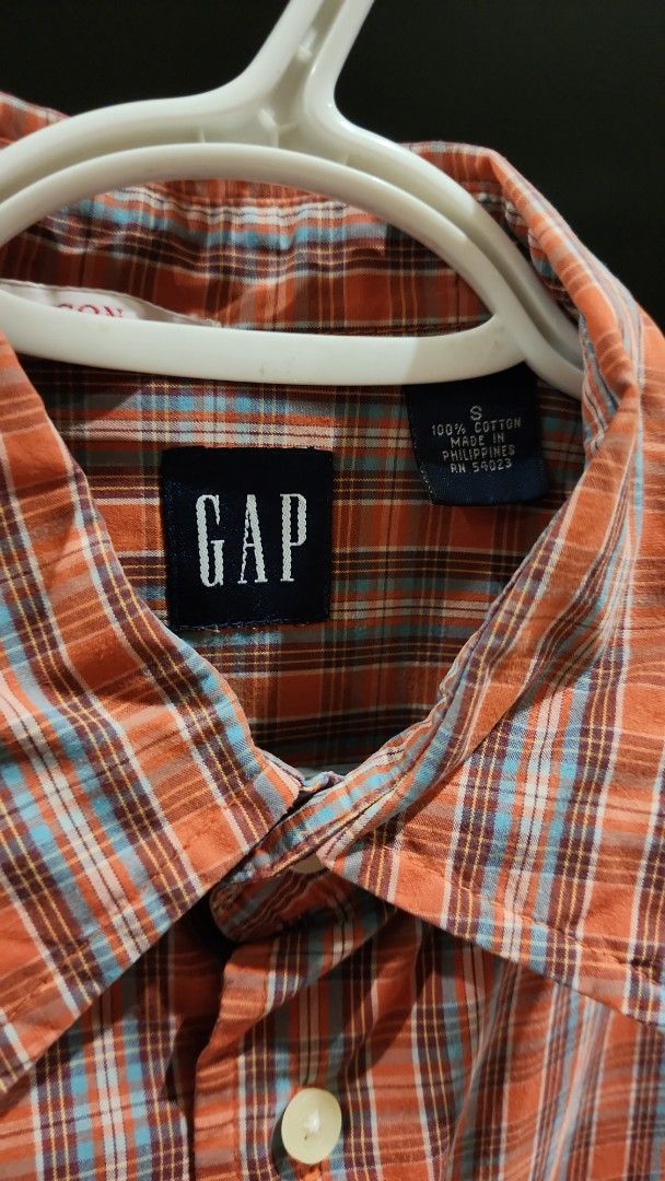 Vintage GAP Plaid Shirt - Small (Category: Tshirts & Polo Shirts ) located in Pasig City. Submitted by cornerchemist (Listing ID 1439607006, Image 2). Description: - Vintage GAP plaid shirt - Color: Orange and blue - Size: Small - Material: Cotton - Features: Button-down front, single chest pocket, classic collar, long sleeves - Collection: SUM 01.