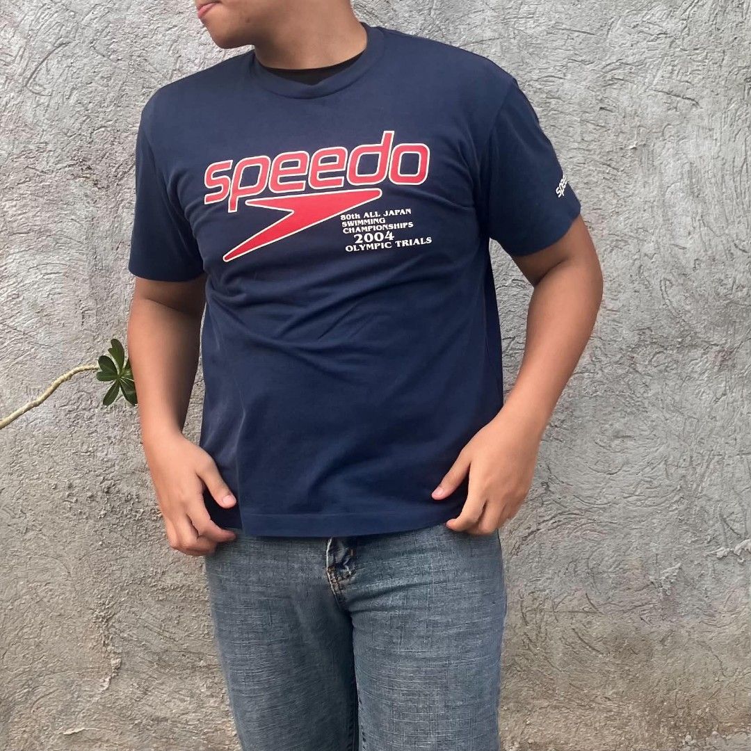 Vintage Speedo Mizuno Japan Released Olympic Championship Tee (Category: Tshirts & Polo Shirts ) located in Manila. Submitted by ninjadisplay (Listing ID 1439526223, Image 3). Description: Brand: Speedo x Mizuno Size: L (Japan Size) Year/Date: 2004 Event: 80th All Japan Swimming Championships / Olympic Trials Material: 55% Cotton, 45% Polyester (Premium textured pique/waffle knit feel) Condition: Excellent vintage condition. Graphic print remains
