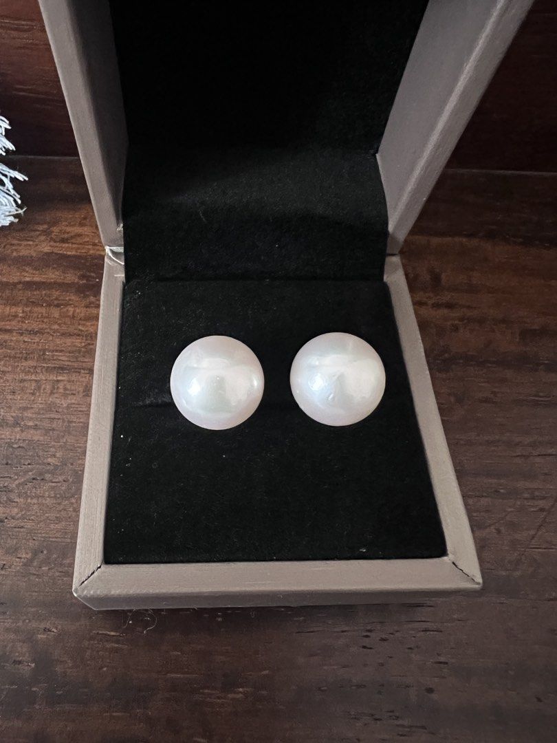 White South Sea Pearl Stud Earrings (Category: Earrings) located in Las Pinas. Submitted by katrt (Listing ID 1439486097, Image 1). Description: - 14.5mm, round, white with pink overtone, high luster, few fish bites, south sea pearls - Setting: 14k yellow gold - bought from al & sam greenhills - rfs: too many pearls.