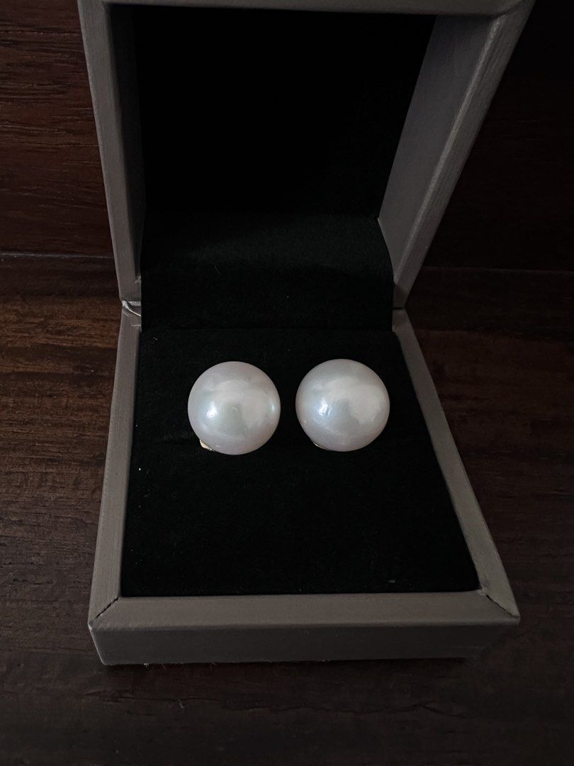 White South Sea Pearl Stud Earrings (Category: Earrings) located in Las Pinas. Submitted by katrt (Listing ID 1439486097, Image 3). Description: - 14.5mm, round, white with pink overtone, high luster, few fish bites, south sea pearls - Setting: 14k yellow gold - bought from al & sam greenhills - rfs: too many pearls.