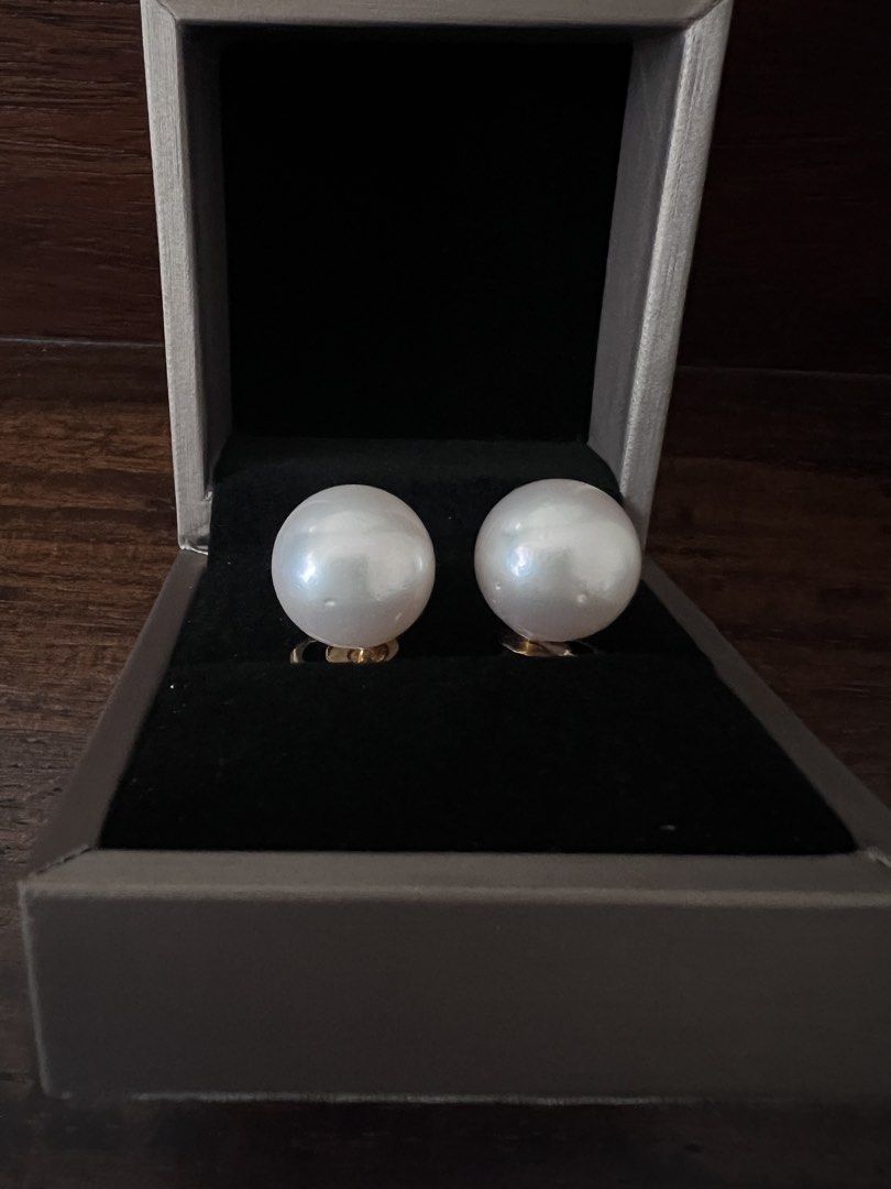 White South Sea Pearl Stud Earrings (Category: Earrings) located in Las Pinas. Submitted by katrt (Listing ID 1439486097, Image 2). Description: - 14.5mm, round, white with pink overtone, high luster, few fish bites, south sea pearls - Setting: 14k yellow gold - bought from al & sam greenhills - rfs: too many pearls.