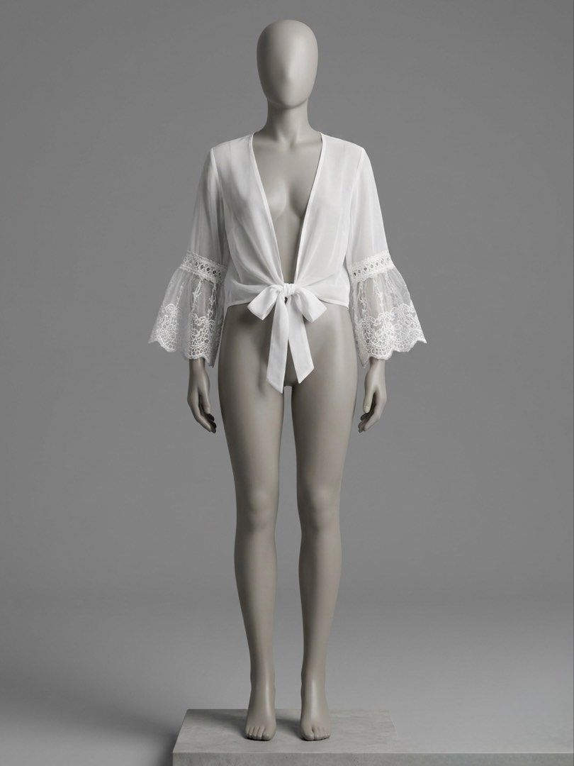 SHEIN White Tie-Front Blouse with Lace Sleeves 10 (Category: Blouses) located in Manila. Submitted by qwerty.findsph (Listing ID 1439596021, Image 1). Description: - White tie-front blouse - Long sleeves with lace cuffs - Lightweight, flowing fabric - Great for layering or wearing alone - Dress up or down.