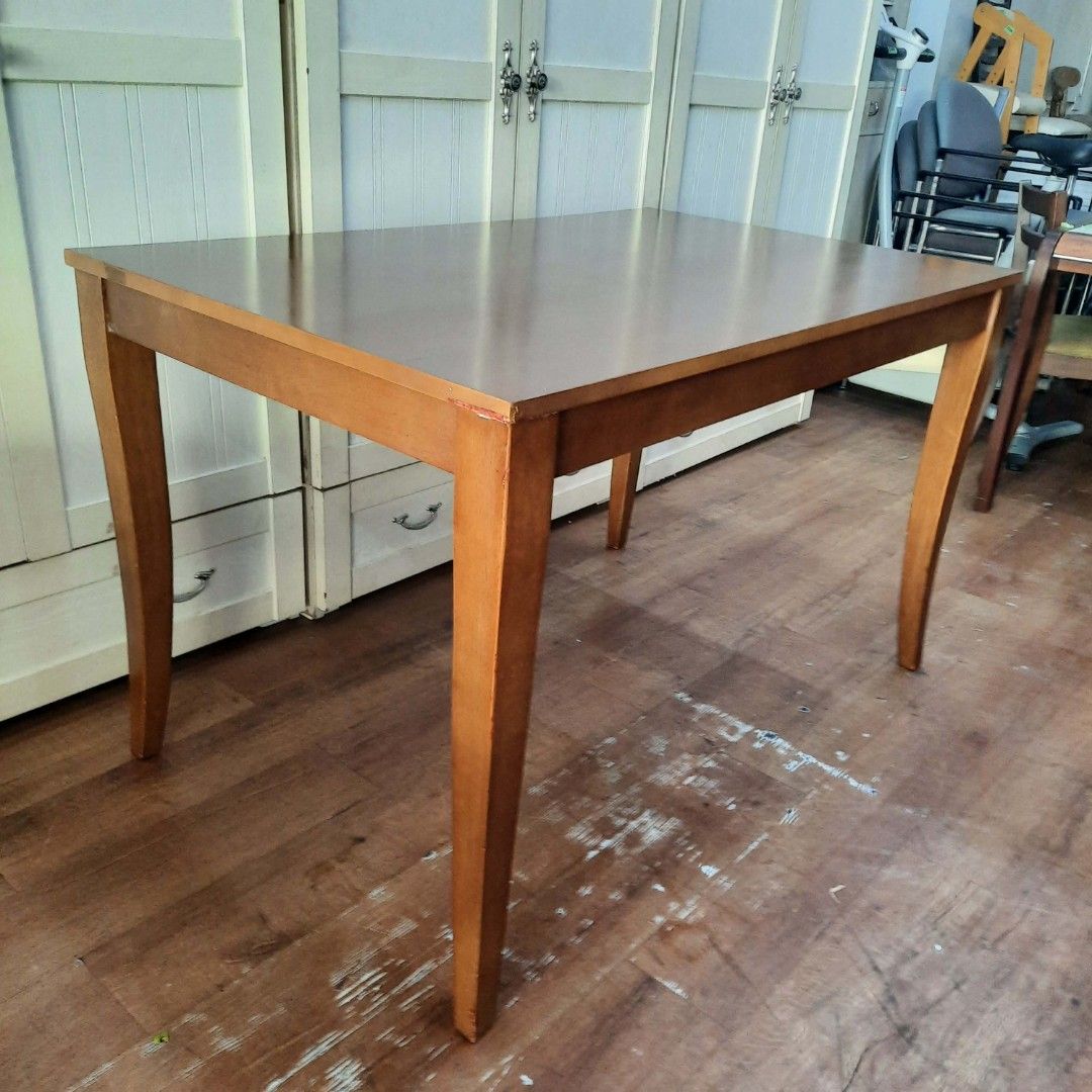 Wooden Dining Table - 120x75x74cm (Category: Tables & Sets) located in Manila. Submitted by ivan_furnitures421 (Listing ID 1439570216, Image 1). Description: - Wooden dining table - Dimensions: L120cm x W75cm x H74cm - Warm wood finish - Sturdy legs - Suitable for small dining areas or workspace - Classic design.