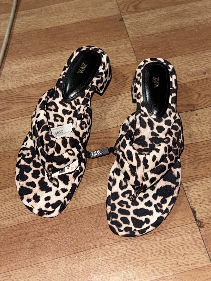 Zara Leopard Print Sandals (Category: Flats & Sandals) located in Manila. Submitted by welllovedstuff03 (Listing ID 1439605414, Image 2). Description: - Zara leopard print thong sandals - Size 37 - Small heel - Brand new with original price tag - Includes Zara dust bag.