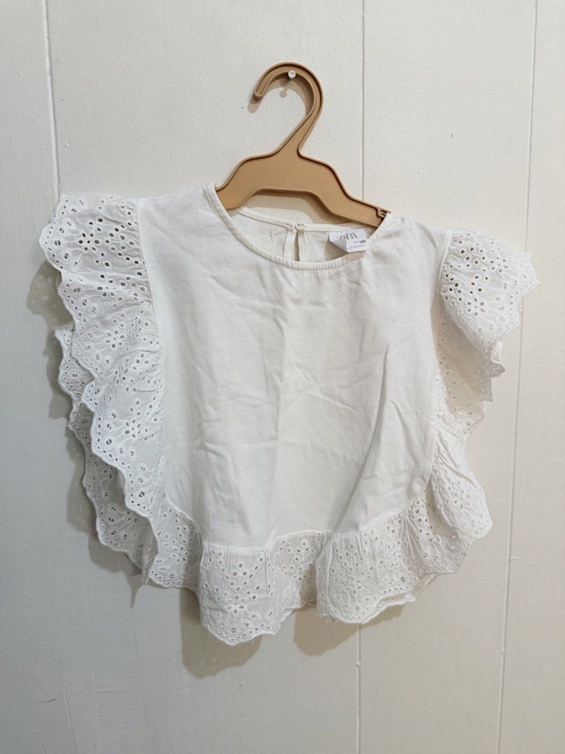 Zara White Shirt Size 8 (Category: Babies & Kids Fashion) located in Valenzuela. Submitted by anichkacloset (Listing ID 1439521580, Image 1). Description: Zara white shirt. Round neckline. Button closure at the back. Size 8. Made in Morocco. Soft fabric..