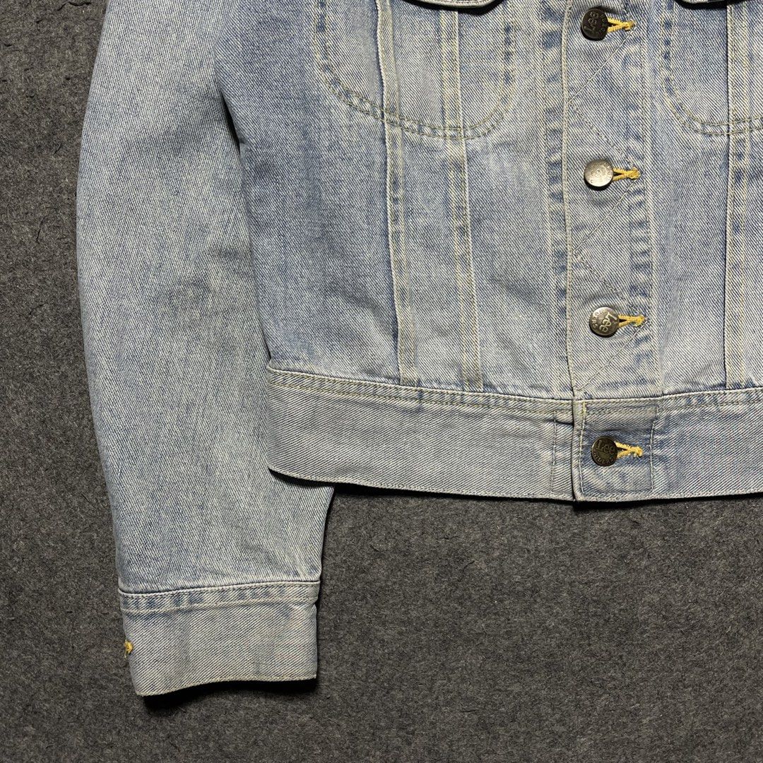1960’s Lee Denim Rider 101-J Jacket (Category: Coats, Jackets and Outerwear) located in Zamboanga. Submitted by rag_20 (Listing ID 1439653945, Image 3). Description: 1960’s Lee Denim Rider 101-J Jacket Lee denim jacket features a distinctive slim-fitting, short-waisted silhouette with slanted chest pockets, a sharp zigzag placket stitch, and iconic cat-eye adjustment buttons at the waist. Authentic 1960s models never feature side handwarmer pocke