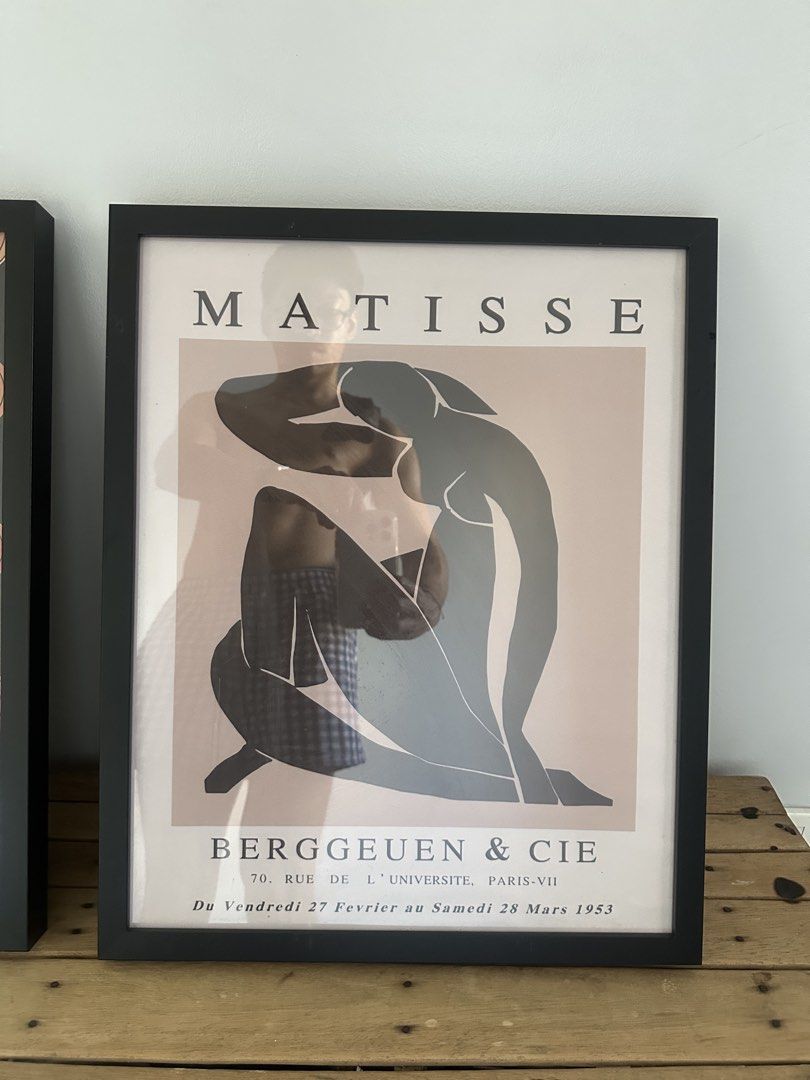 2pcs Frame 40x50 cm + Art Prints - Matisse & Abstract (Category: Frames & Pictures) located in Mandaluyong City. Submitted by bykneel (Listing ID 1439640538, Image 2). Description: - Set of two framed art prints 40x50 cm - Includes a Matisse print with a figure - Features an abstract design print - Both prints are framed in black - Prints displayed on a wooden surface - Matisse print includes text from Berggruen & Cie, Paris-VII.