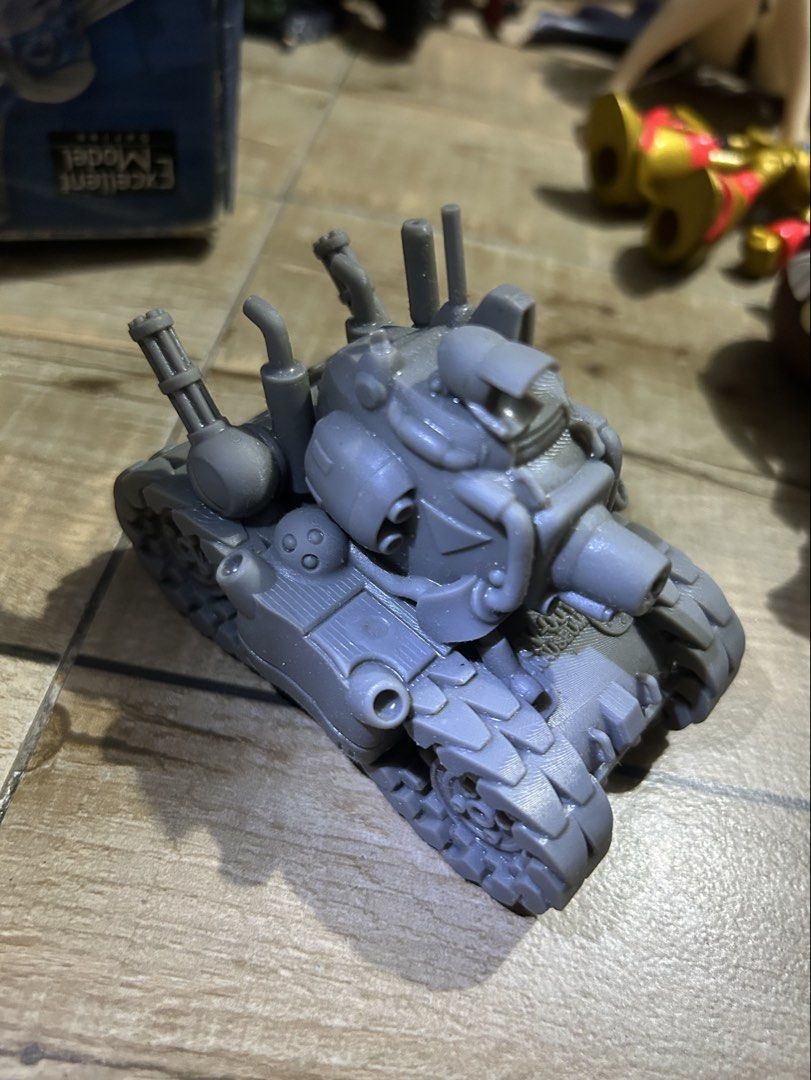 3D printed Metal Slug Tank Model Figure (Category: Gundam & Model Kits) located in Paranaque City. Submitted by zac.sei (Listing ID 1439761165, Image 1). Description: - Miniature gray tank model - Detailed design - Multiple turrets - Exhaust pipes - Detailed track system - Made of solid material - Uniform gray color - paint it .