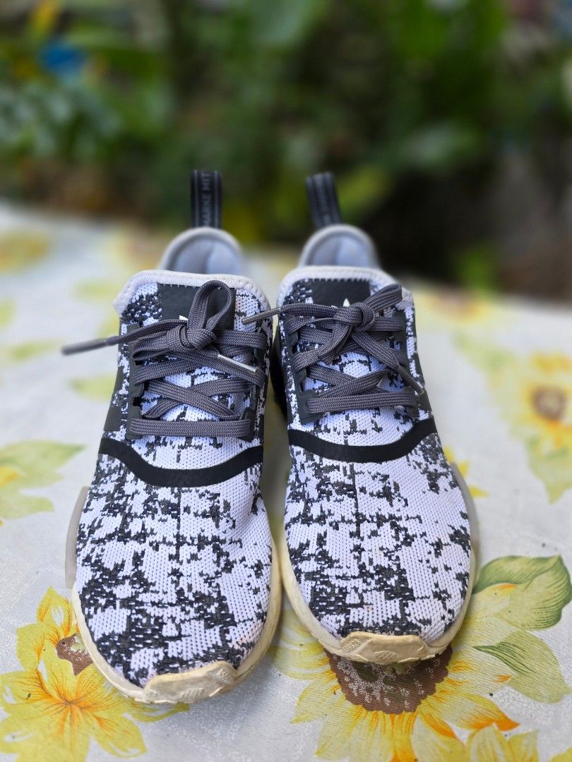 Adidas NMD R1 Sneakers (Category: Sneakers) located in Caloocan City. Submitted by mylenenm (Listing ID 1439683958, Image 2). Description: - Adidas NMD R1 sneakers - Black and white pattern - Adidas logo on tongue and insole - Gray laces - White sole - Adidas branding on heel tab - size: US 5.5.