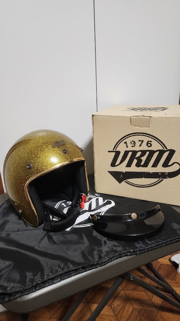 Altrax VRM Gold Glitter Motorcycle Helmet (Category: Helmets and other Riding Gears) located in Manila. Submitted by jmgco (Listing ID 1439797203, Image 1). Description: Altrax Gold Glitter Helmet bought from VRM Vintage Rider Manila SRP: 6,295 Selling Price: 5,300 Size XL Good as new Comes with peak, original box and bag Gold Glitter color with ICC sticker Purchased May 2, 2026 RFS: too many helmets, impulse buying .