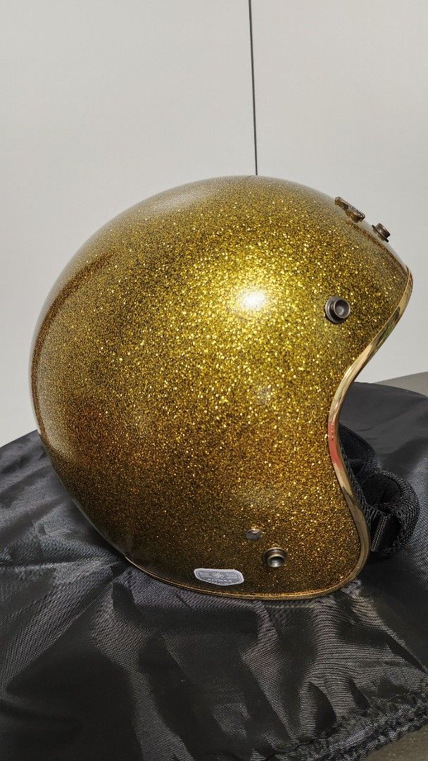 Altrax VRM Gold Glitter Motorcycle Helmet (Category: Helmets and other Riding Gears) located in Manila. Submitted by jmgco (Listing ID 1439797203, Image 3). Description: Altrax Gold Glitter Helmet bought from VRM Vintage Rider Manila SRP: 6,295 Selling Price: 5,300 Size XL Good as new Comes with peak, original box and bag Gold Glitter color with ICC sticker Purchased May 2, 2026 RFS: too many helmets, impulse buying .