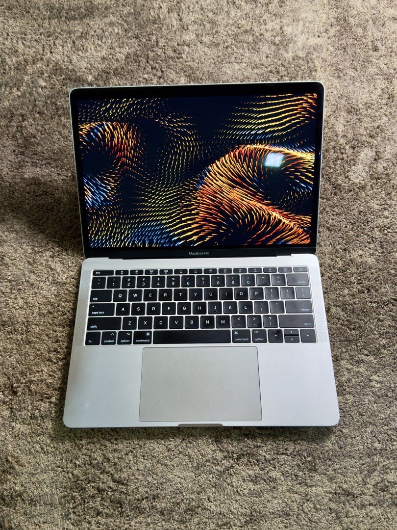 MacBook Pro 13-inch 2017 (Category: Laptops & Notebooks) located in Angeles City. Submitted by byeket (Listing ID 1439705892, Image 2). Description: Details - MacBook Pro 13-inch 2017 - 2.5GHz Dual-Core Intel Core i7 - 16GB RAM - 512GB SSD - Two Thunderbolt v3 ports - Silver color - No box, no charger Notes - Battery replaced and battery health currently normal (see photo) - Laptop easily gets hot (known problem for this unit) - Heavily used for 