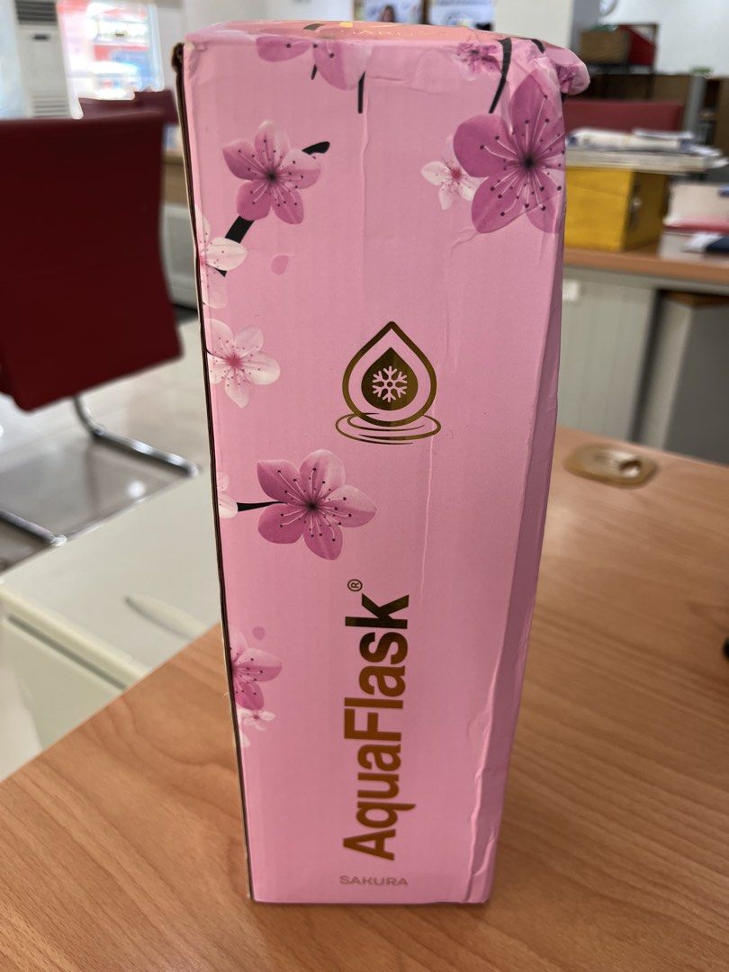 AquaFlask Sakura 40oz Water Bottle (Category: Water Bottles & Tumblers) located in Legazpi City. Submitted by mblangcauon (Listing ID 1439653517, Image 2). Description: - AquaFlask 40oz water bottle - Pink color with Sakura design - Keeps drinks cold - Features a handle on the lid - Comes with original box.
