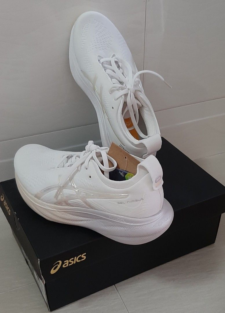 Asics Gel Nimbus 25 Anniversary White Sneakers (Category: Sneakers) located in Singapore. Submitted by sobasan (Listing ID 1439648074, Image 2). Description: - Brand new Asics Gel Nimbus 25 Anniversary sneakers - Color: White/Rose Dust - Size: US 6 / EUR 37/ UK 4 BR 34.5 AR 35.5 CM 23.0 - Condition: Never worn, with original box and tags,less than 1 year. - Perfect for running and casual wear - Comfortable and stylish price Negotiable.