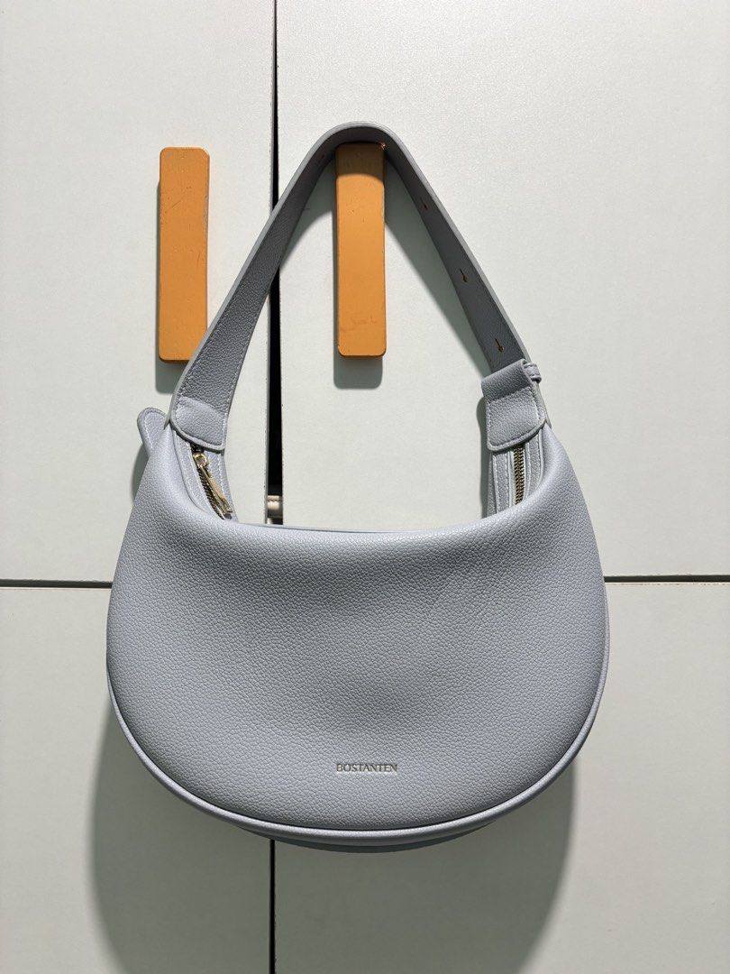 [AUTHENTIC 💯] Bostanten Light Blue Moon Bag (Category: Shoulder Bags) located in Manila. Submitted by codeofethixx (Listing ID 1439694508, Image 1). Description: PRICE IS FIXED ⭕️ NO HAGGLING AND NO TO SENSITIVE BUYER ❌ Pls check pics for condition po. This is a preloved bag, pls manage your expectations :)) Let’s not waste each other’s time po if hindi sure buyer Mode of Payment: Any - transfer to my GoTyme account I can ship same day immediate