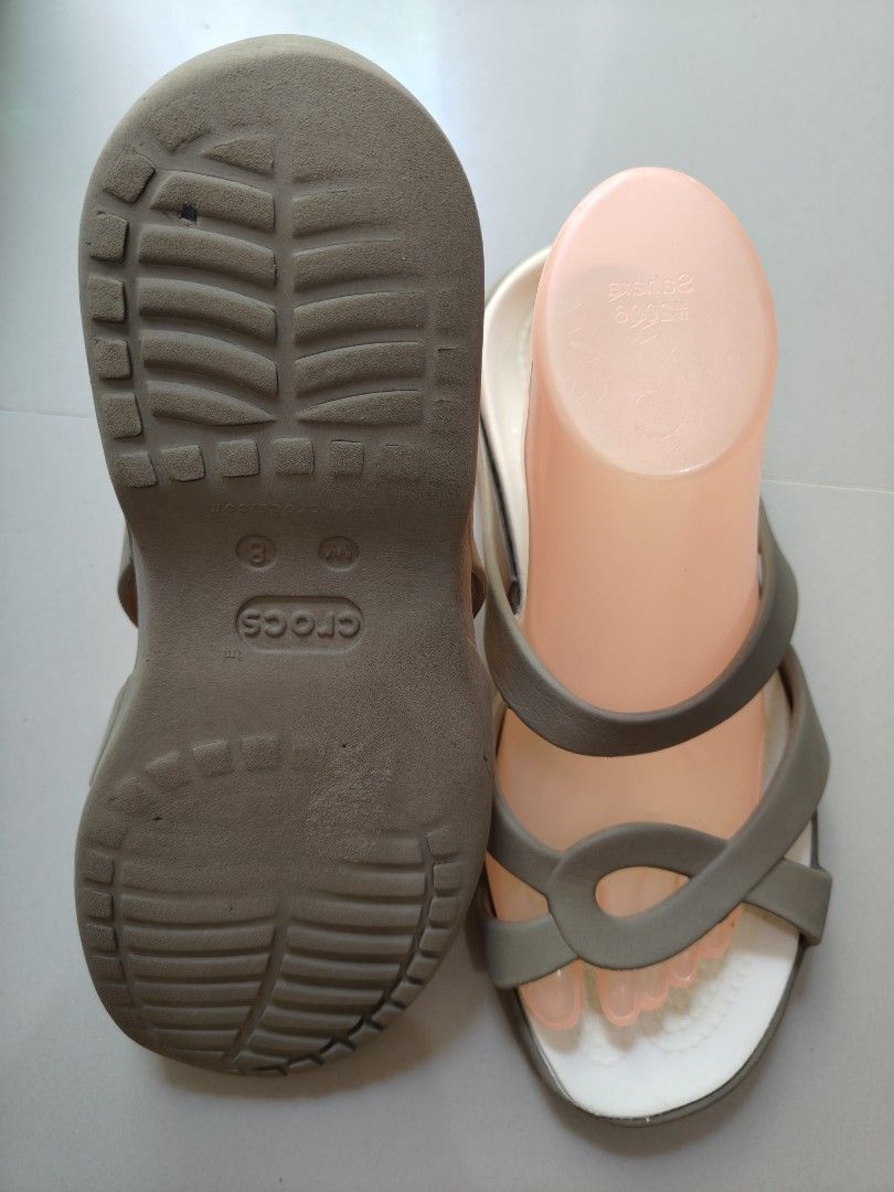 Authentic Crocs Women's Sandals - W8 (Category: Flats & Sandals) located in Calamba. Submitted by an_ne0501 (Listing ID 1439748991, Image 3). Description: - 25cm insole - Crocs sandals - White footbed, gray straps - Comfortable design - Crocs logo and size on sole.