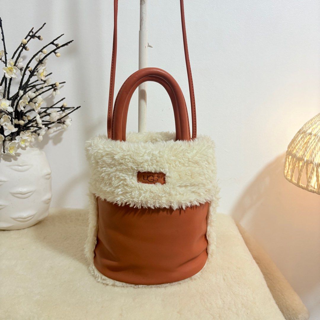 Authentic UGG Fur and Leather Bucket 2 Way Bag (Category: Cross-body Bags) located in Binangonan. Submitted by makoleksyon (Listing ID 1439785597, Image 1). Description: Excellent condition Like new No flaws Super ganda dami nalalagay Bought in Japan 💯% Authentic Money back guarantee .