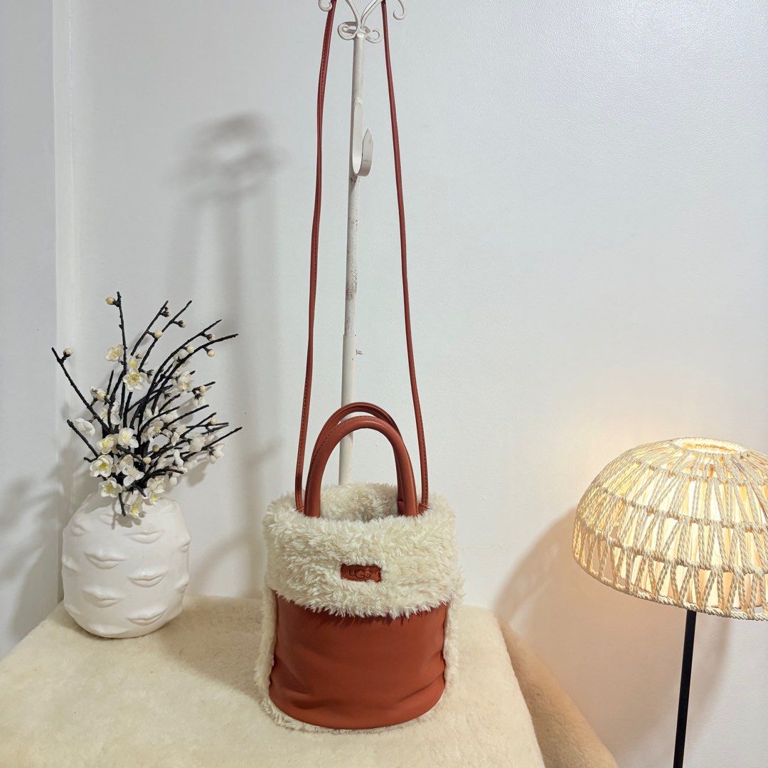 Authentic UGG Fur and Leather Bucket 2 Way Bag (Category: Cross-body Bags) located in Binangonan. Submitted by makoleksyon (Listing ID 1439785597, Image 2). Description: Excellent condition Like new No flaws Super ganda dami nalalagay Bought in Japan 💯% Authentic Money back guarantee .