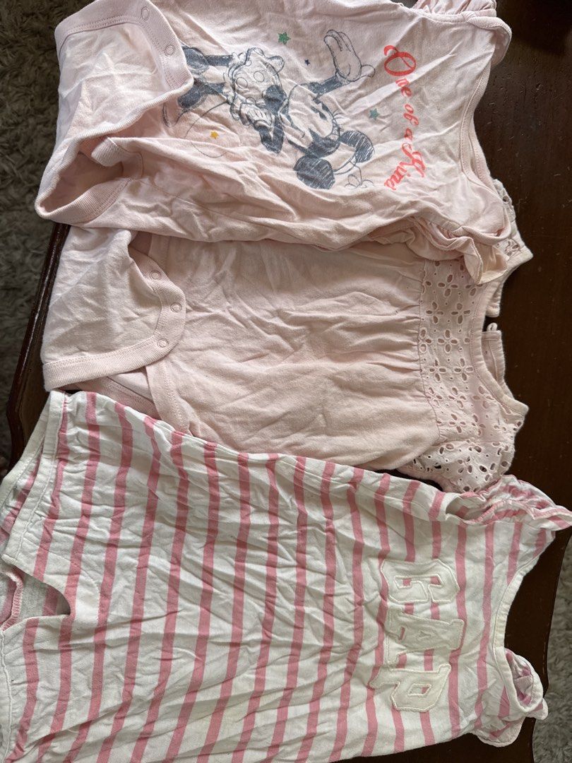 Baby Girl Rompers Set (Category: Babies & Kids Fashion) located in Silang. Submitted by iceeicee (Listing ID 1439621064, Image 1). Description: - Adorable baby girl romper set. - Includes: - Pink Minnie Mouse print romper - Plain pink romper - Striped "GAP" romper - Made from soft, comfortable fabric. - Easy to put on and take off. - Perfect for playdates and casual outings..