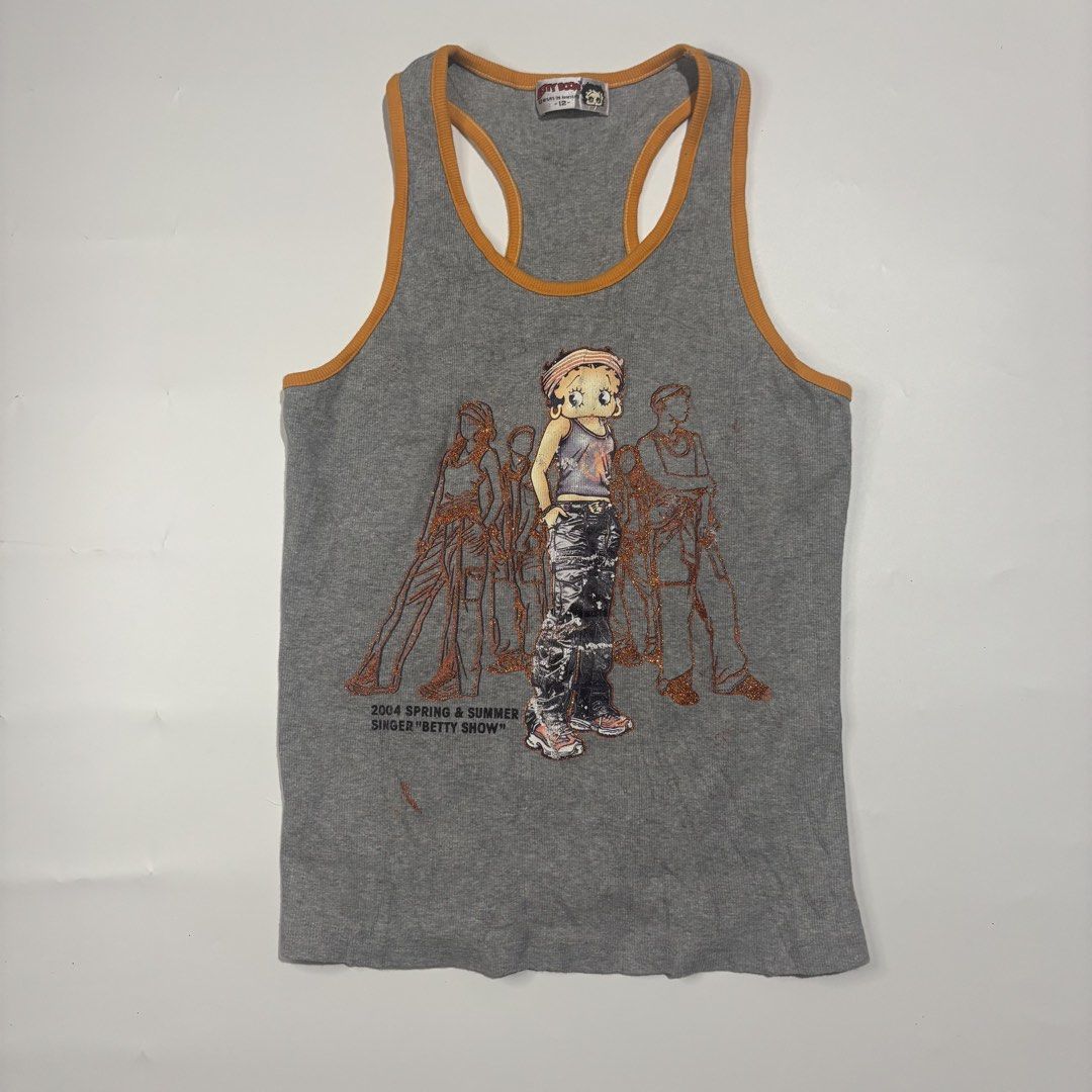 Betty Boop Tank Top (Category: Sleeveless) located in Cebu City. Submitted by kidfrom6000 (Listing ID 1439770442, Image 1). Description: Gray tank top featuring a Betty Boop graphic. It has an orange trim and a racerback design. The graphic includes the text "2004 Spring & Summer Singer 'Betty Show'". The tag indicates a size 12. Dimensions can be seen in the picture.