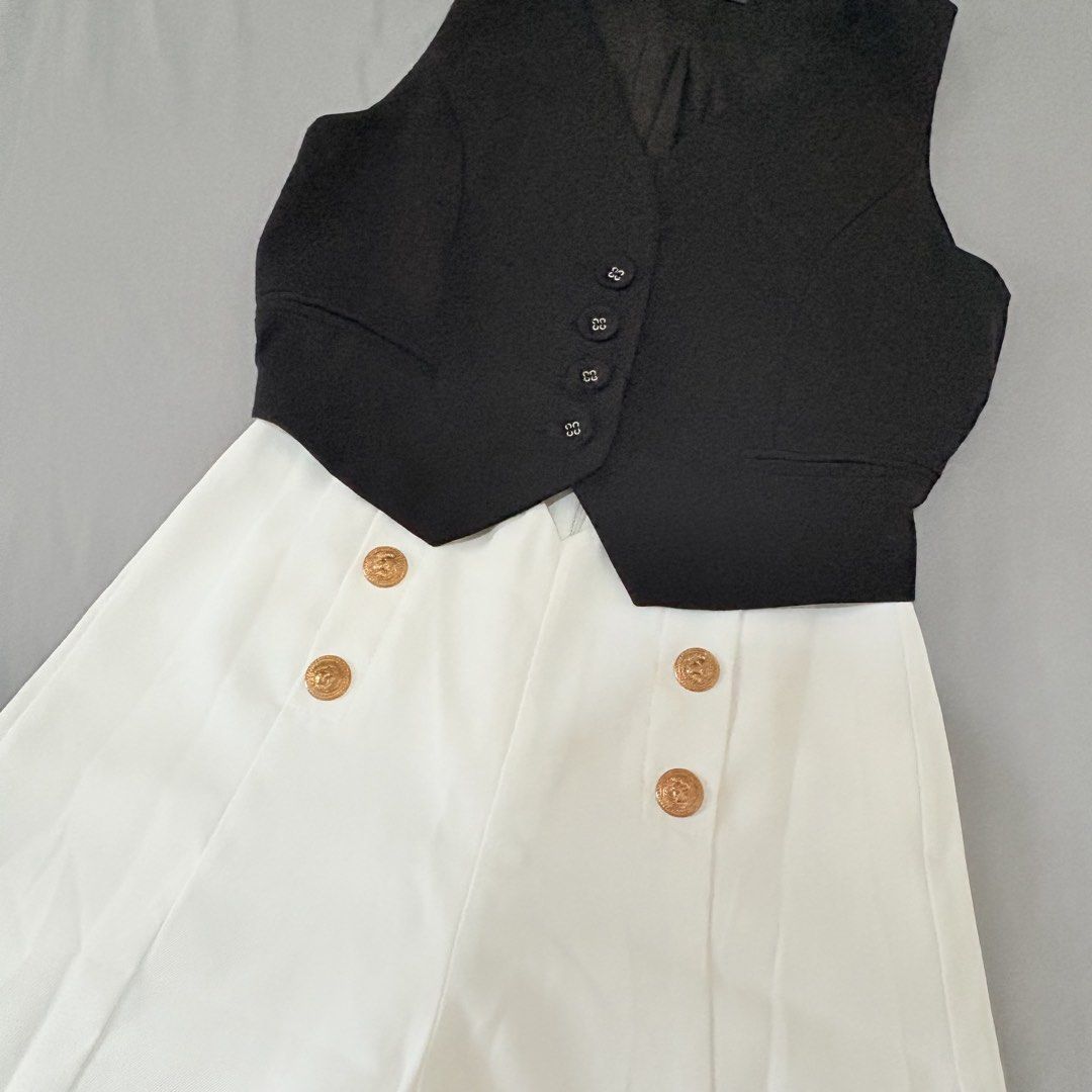Black Vest and White Shorts Set (Category: Sets or Coordinates) located in Quezon City. Submitted by mae_iggy (Listing ID 1439698936, Image 1). Description: - Stylish black vest - Paired with high-waisted white shorts - Vest features a button-down design - Shorts have decorative buttons - Perfect for a chic and versatile look - Great for casual outings or special occasions - A fashionable wardrobe addition.