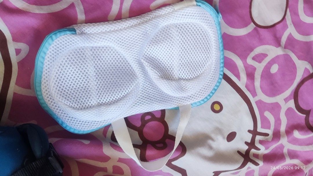 Bra Laundry Bag (Category: Laundry Baskets) located in Manila. Submitted by ruane_raleigh12 (Listing ID 1439671479, Image 1). Description: - Protects delicate bras during washing. - Mesh design with blue trim. - Includes a convenient handle. - Features two compartments, ideal for bras. - Helps maintain bra shape and quality..