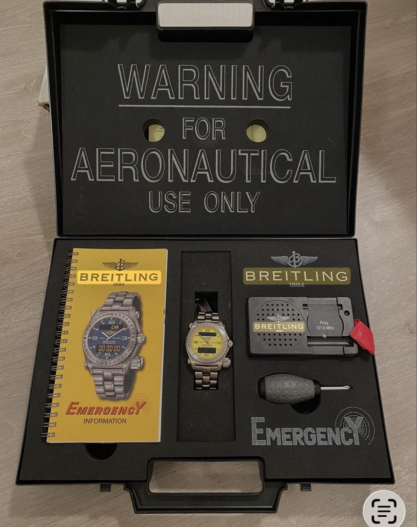 Breitling Emergency Watch Kit (Category: Luxury Watches) located in Manila. Submitted by gravitykicks (Listing ID 1439646015, Image 1). Description: - Breitling Emergency watch kit - Includes: Watch, manual, radio transmitter, screwdriver - Watch features: Yellow face, stainless steel band - Case: Black, with "WARNING FOR AERONAUTICAL USE ONLY" printed on the inside lid - New battery needed - 100% Authentic - Full set complete with box and papers