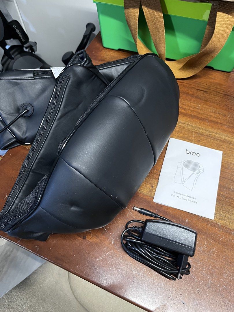 Breo Neck Shoulder Massager with Heat (Category: Massage Devices) located in Taguig. Submitted by lonelyclothes (Listing ID 1439687984, Image 3). Description: - Breo Neck F4 Massager - Designed for home use - Includes massager unit, power adapter, and user manual - Features heat function - Black color - Provides a relaxing massage experience.