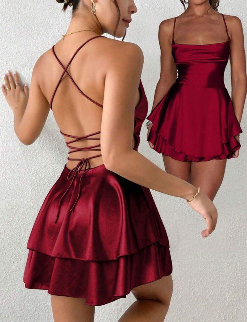 Burgundy Satin Mini Dress (Category: Dresses) located in Caloocan City. Submitted by oncewornsociety (Listing ID 1439786377, Image 2). Description: - Elegant burgundy mini dress - Cowl neckline and spaghetti straps - Layered, flared skirt - Criss-cross back with tie closure - Perfect for parties and special occasions.